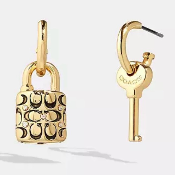 FREE FREE COACH earrings retail $95. With a $400 purchase. 2 n stock - Picture 1 of 6